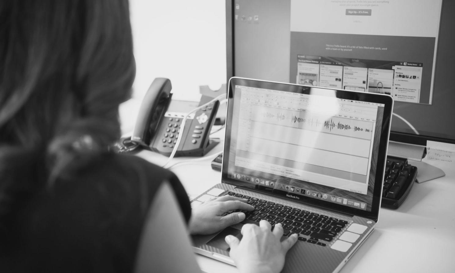 Team members reviewing budget forecasts and expense reports together